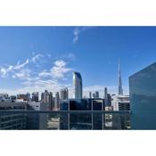 Futuristic 1 bedroom apt with Burj khalifa view & pool 5min walk to Dubai mall