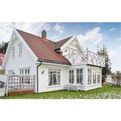 Stunning home in Fjell with WiFi and 3 Bedrooms