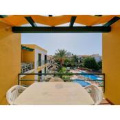 2 bedroom flat with pool and garden