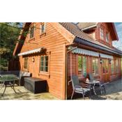 Awesome home in Farsund with 4 Bedrooms, Sauna and WiFi