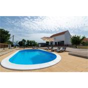 Awesome home in Pridraga with Outdoor swimming pool, WiFi and 4 Bedrooms