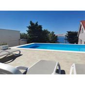 Beachfront apartments Baricevic with pool