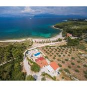Beachfront House Mir with private pool and jacuzzi right at the beach in beautiful bay in Mirca - Brac