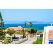 Bohemian Seafront Bungalow Paradise with BBQ, Garden, Terrace & Free Wifi by Holidays Home