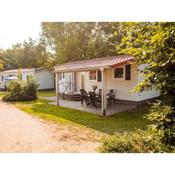 Detached chalet in holiday park swimming pool and on the Leukermeer