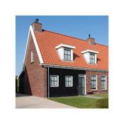 Holiday home with whirlpool and sauna in a quiet area in Zeeland