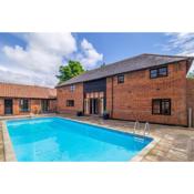 Large barn conversion in a rural stud with a swimming pool - The Old Barn