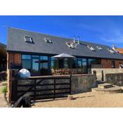 Tithe Barn a Stunning family home with panoramic views